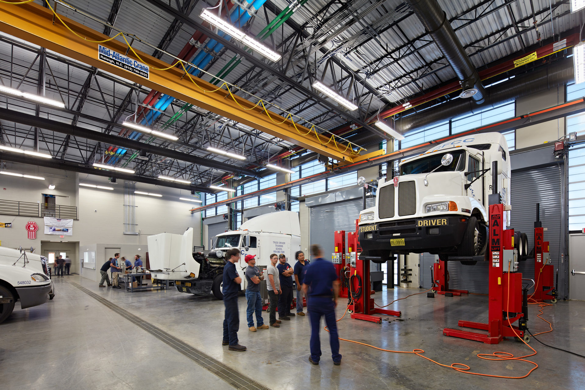 Truck bay at the Heavy Equipment and Transport Technology Building (HEATT) at Cape Fear Community College in Castle Hayne, NC; Architect: Clark Nexsen