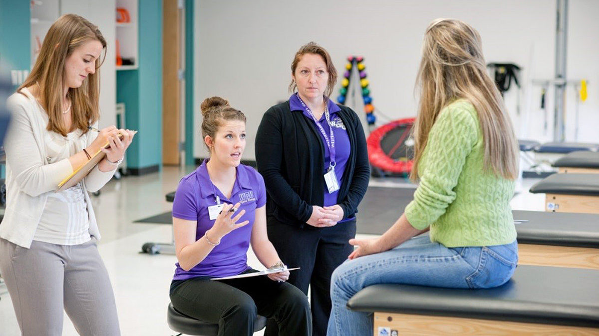 In the physical therapy clinic, patients, students, and professionals collaborate on care and rehabilitation.