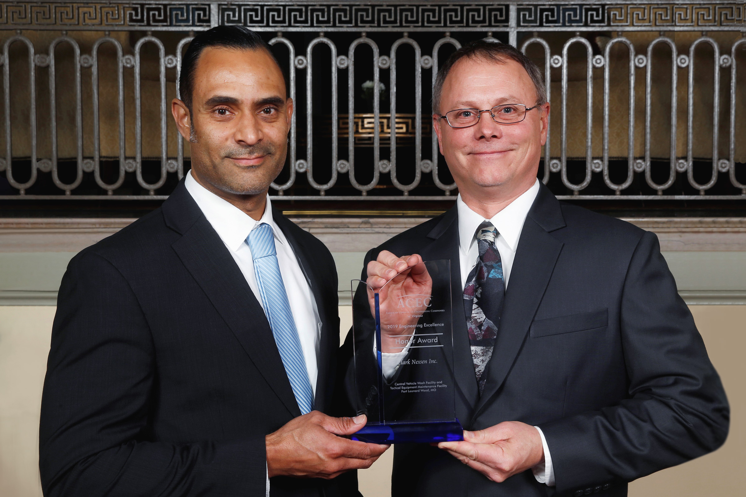 Clark Nexsen project team members Lee Hopson and Rich Clark accepting a 2019 ACEC Virginia Honor Award for Engineering Excellence