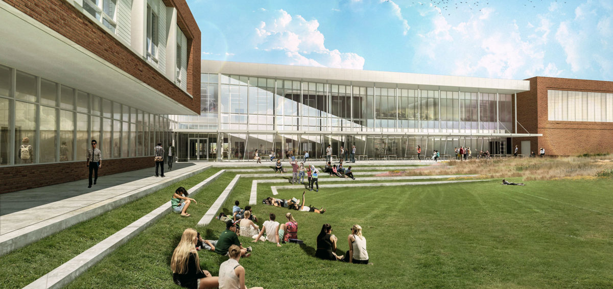 The open field created by the juncture of the L-shaped Innovative High School has become a popular gathering space for recreation, dining, and study. Rendering courtesy Clark Nexsen.