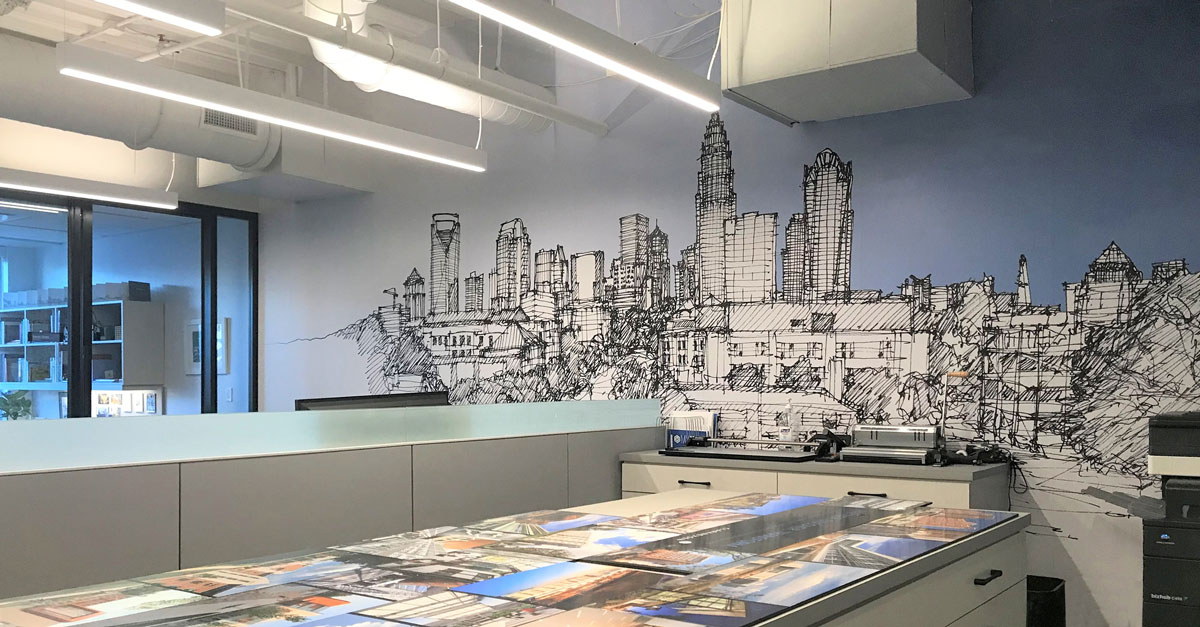 Charlotte office upfit wall mural drawing of skyline by Kevin Utsey