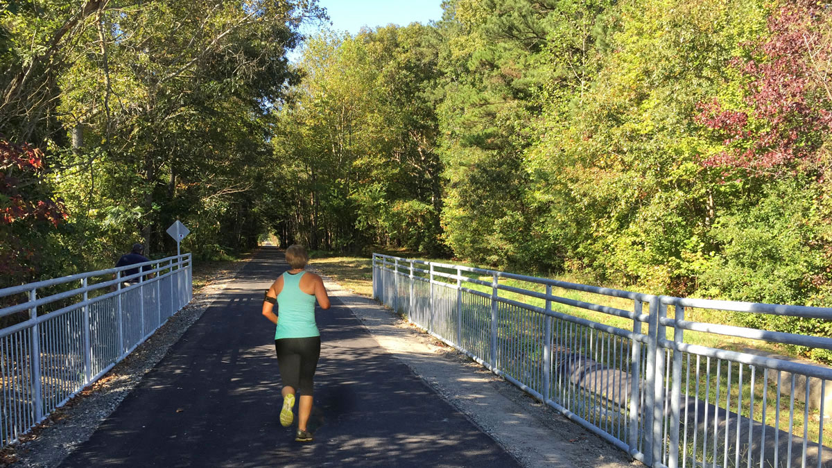 Person running on the Seaboard Coastline Trail